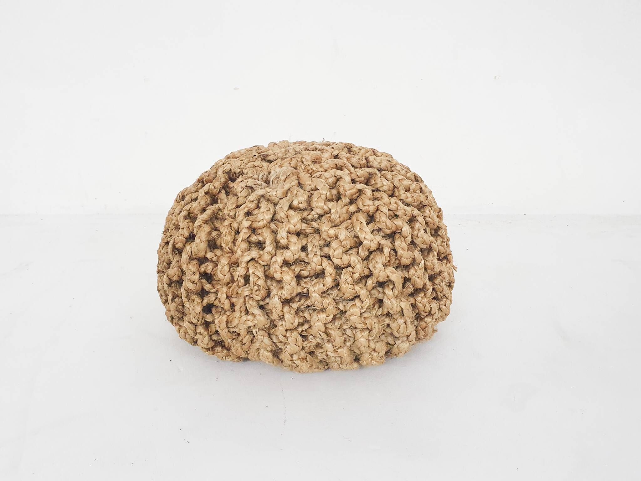 Vintage ottoman made of rope
