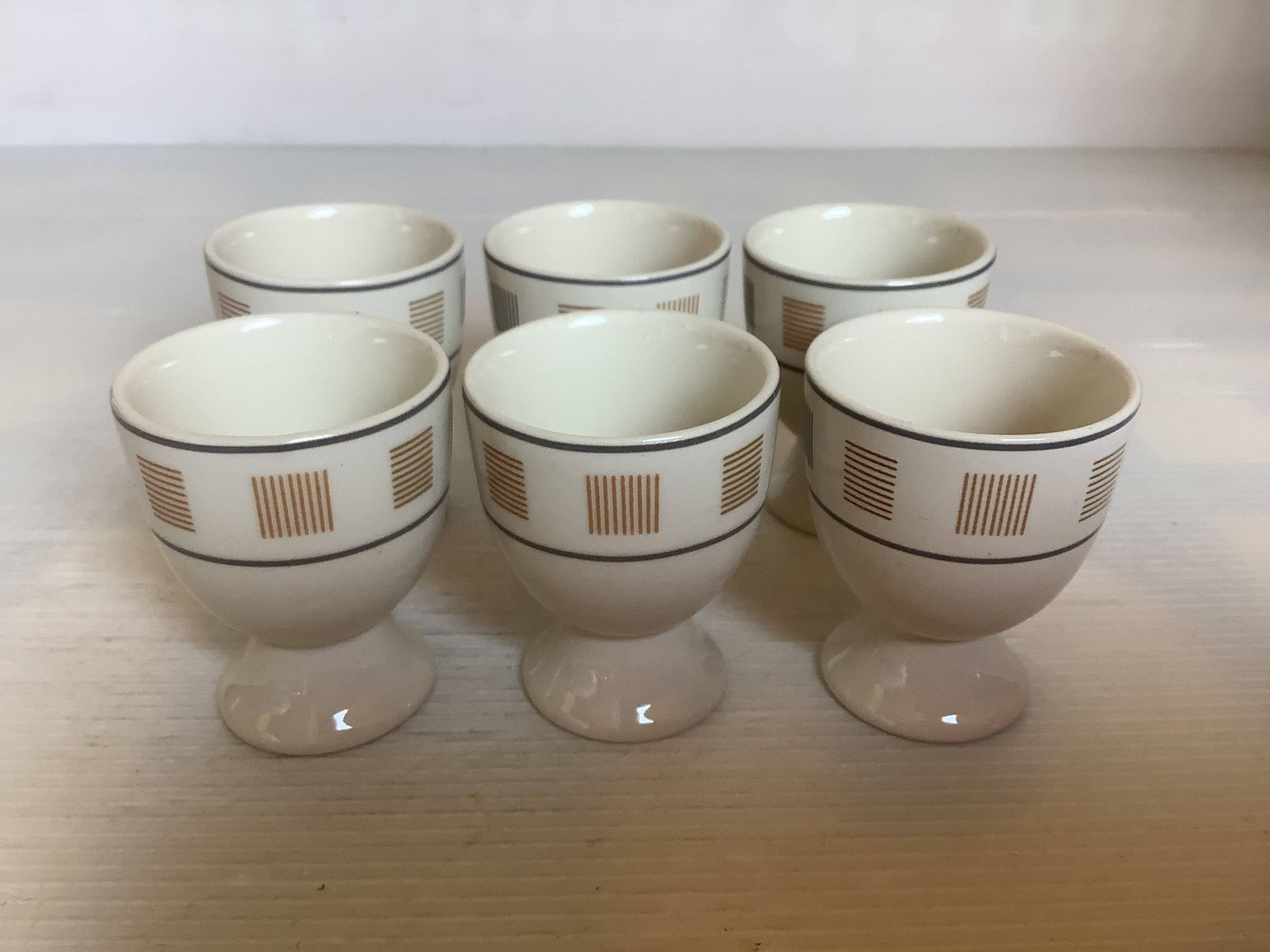 6 coquetiers motifs géométriques beige et marron