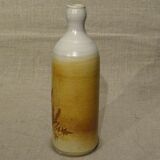 Bottle decorated with Vallauris foliage