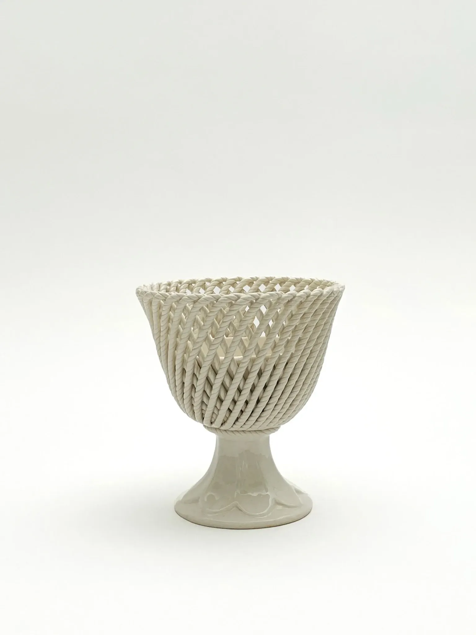 Openwork cup on pedestal