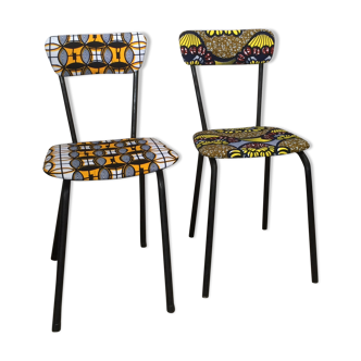 Pair of ethnic chairs in black metal retapissé way wax