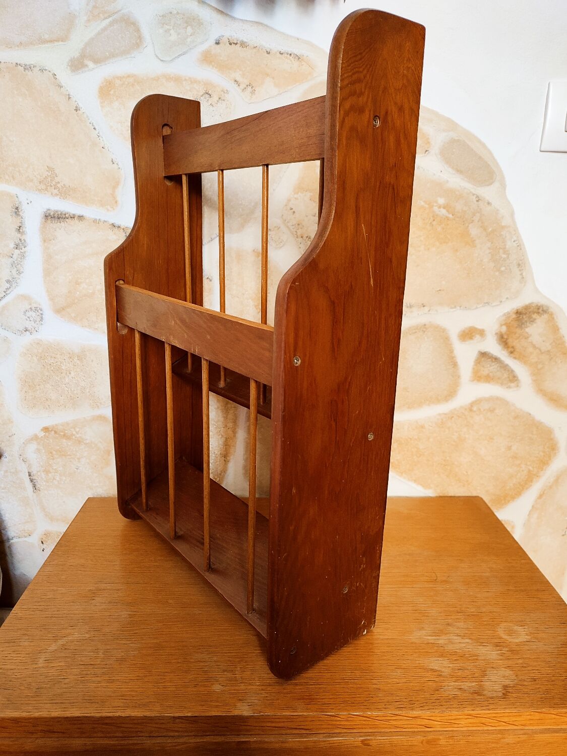 Wooden wall review holder