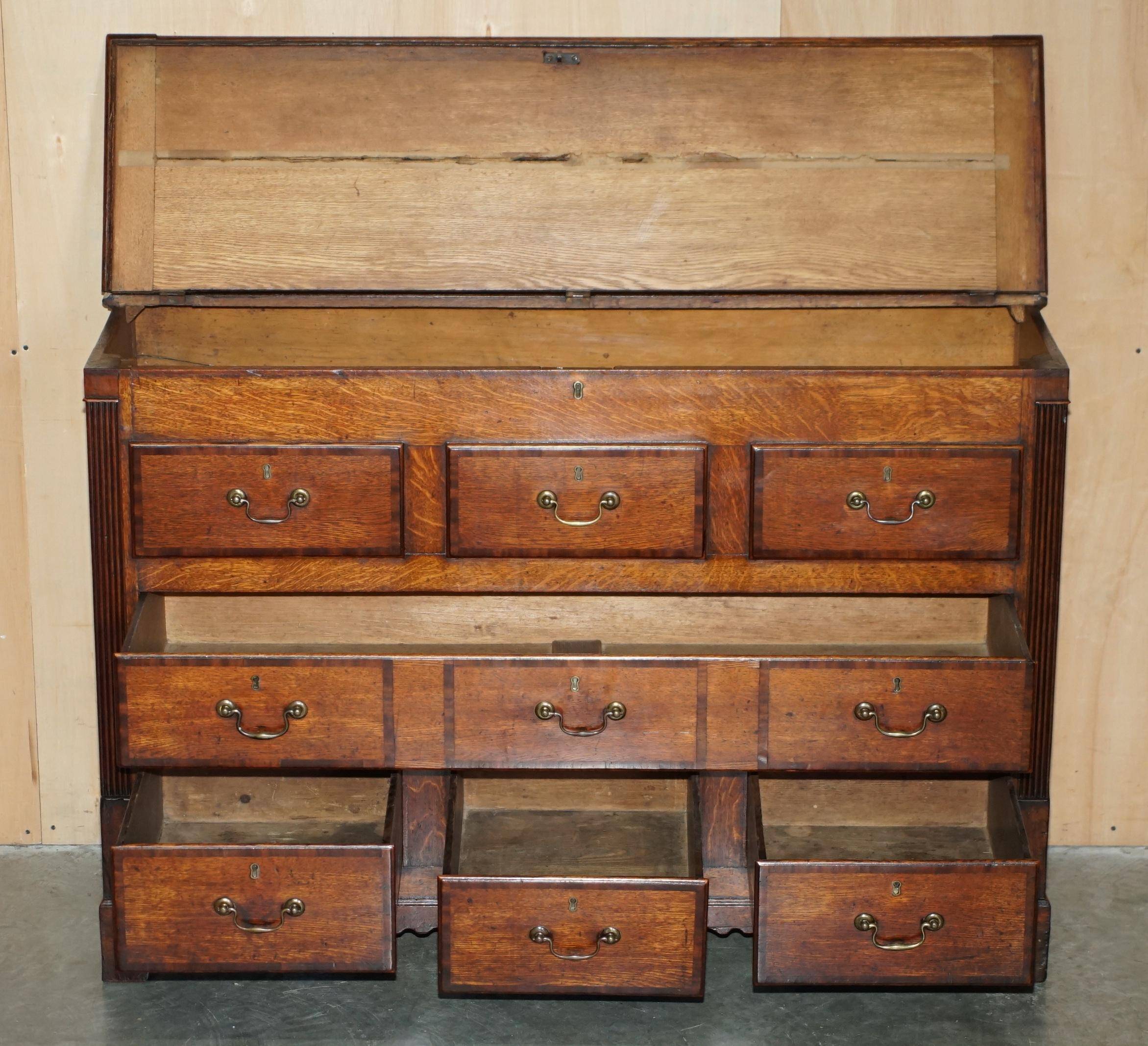 Georgian oak commode with a folding top, English, 18th century.