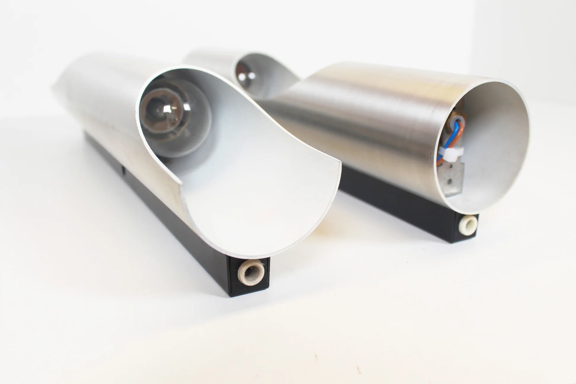 Pair of 70s 'fuga' wall lamps by raak