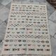 Tapis margoum blanc à motifs berbères multicolores