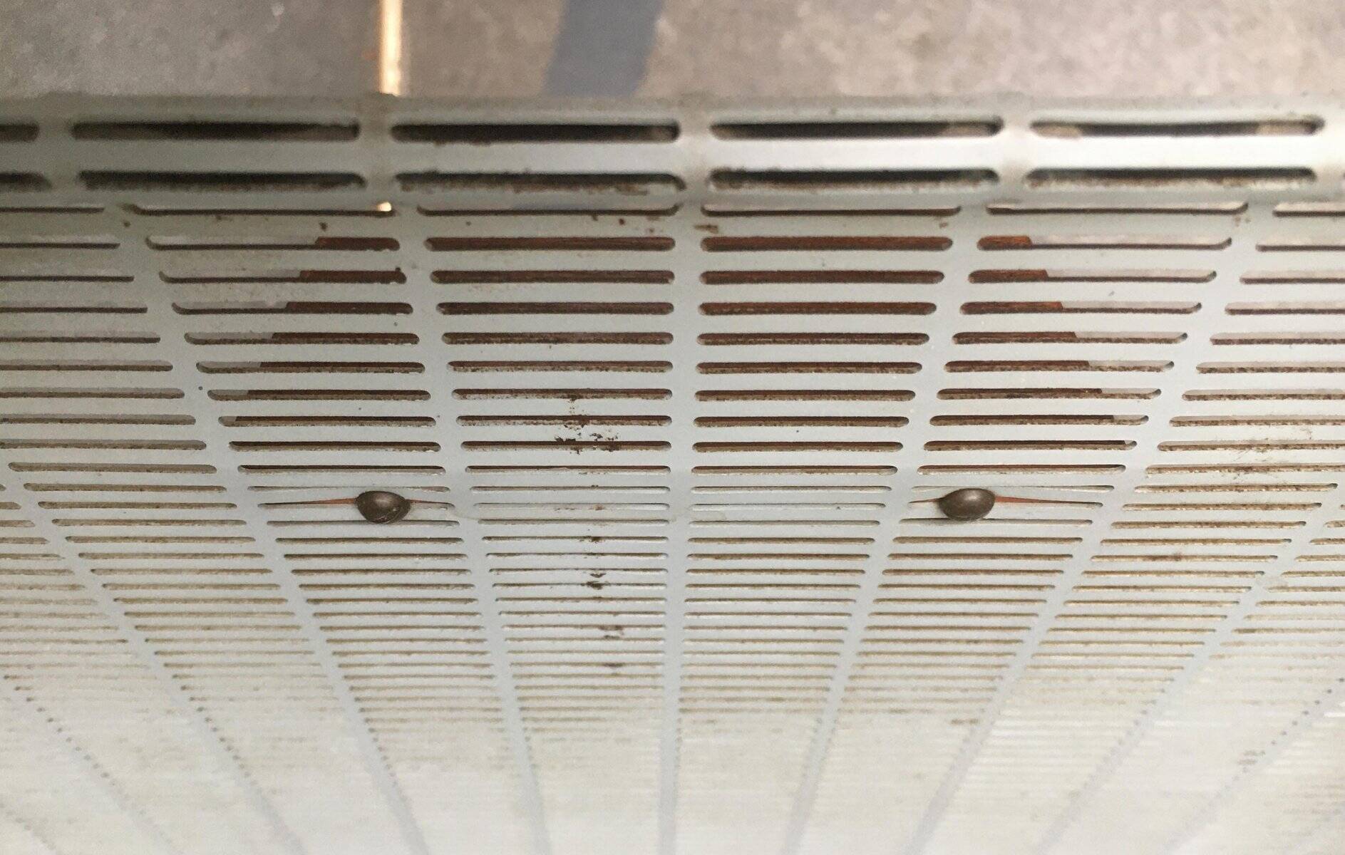 Mid-century teak side table with magazine rack.