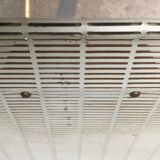 Mid-century teak side table with magazine rack.