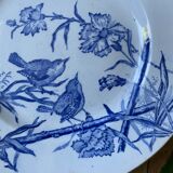 Plate decorated with blue birds and butterflies