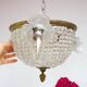 Old bronze ceiling light and 3 tulip flowers