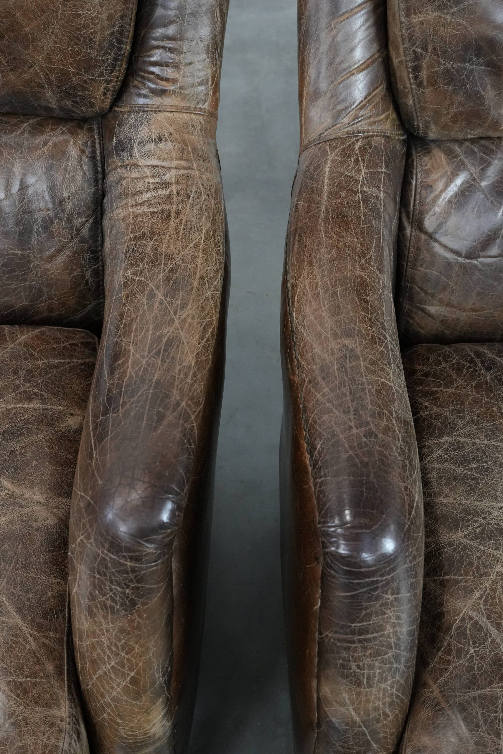 Very comfortable set of two vintage cowhide leather armchairs