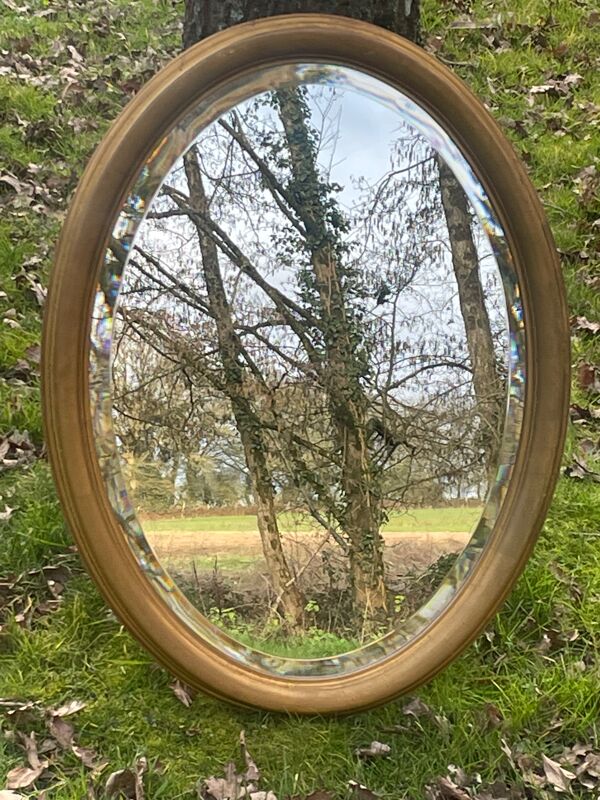 Miroir ovale doré biseauté, 79 x 59 cm