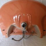 Vintage sink and its orange shelf