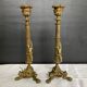 Pair of 19th-century gilded bronze candlesticks in Empire style.
