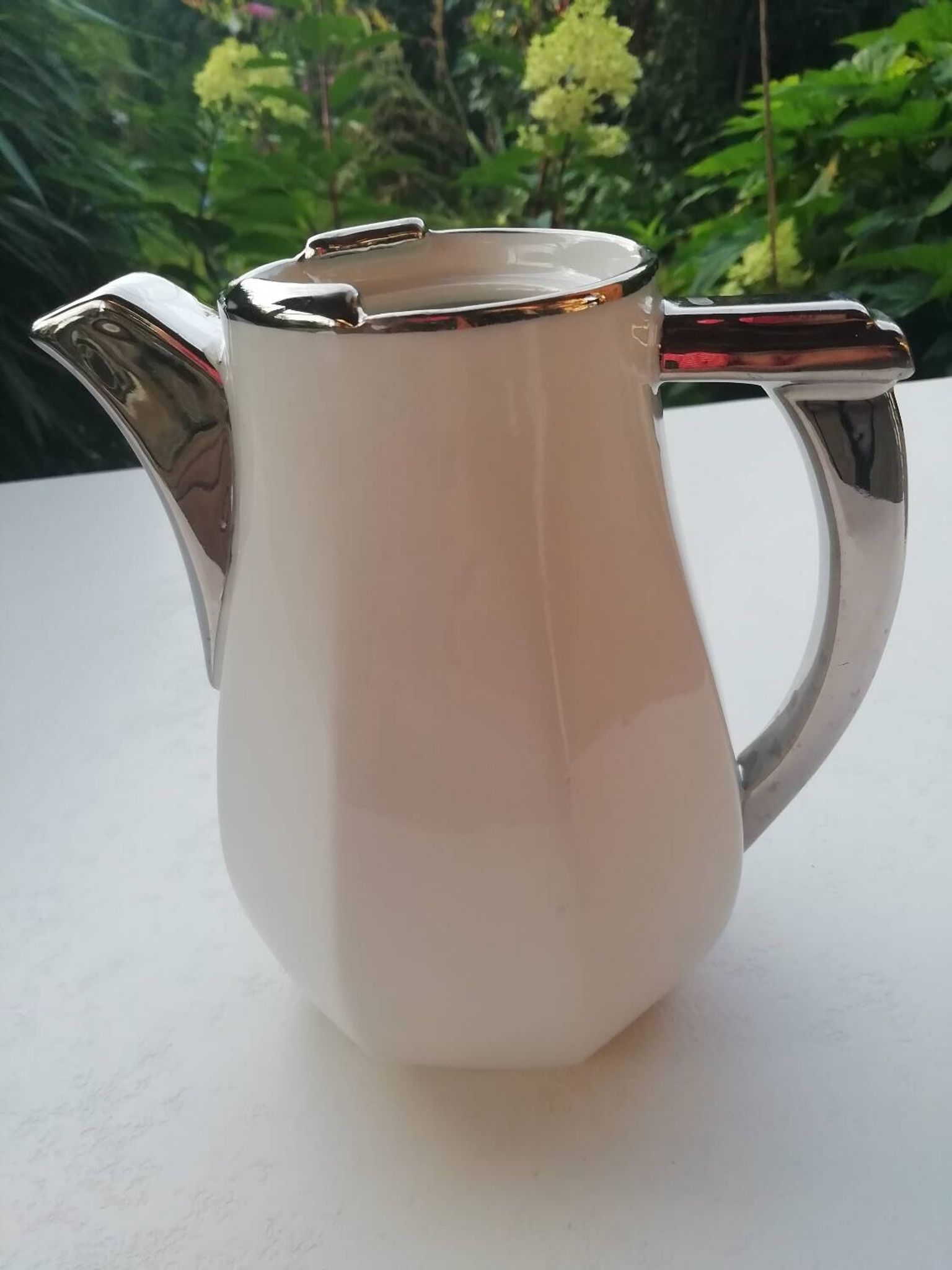 Pair of milk jug teapots
