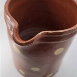 Old pitcher with polka dots savoyard pottery in glazed terracotta alsace