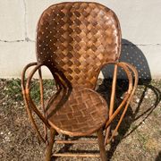 Vintage 1970s armchair in curved woven chestnut + seat cushion