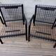 Duo de fauteuils noirs "grillage" en métal