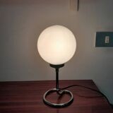 Glass and metal lamp