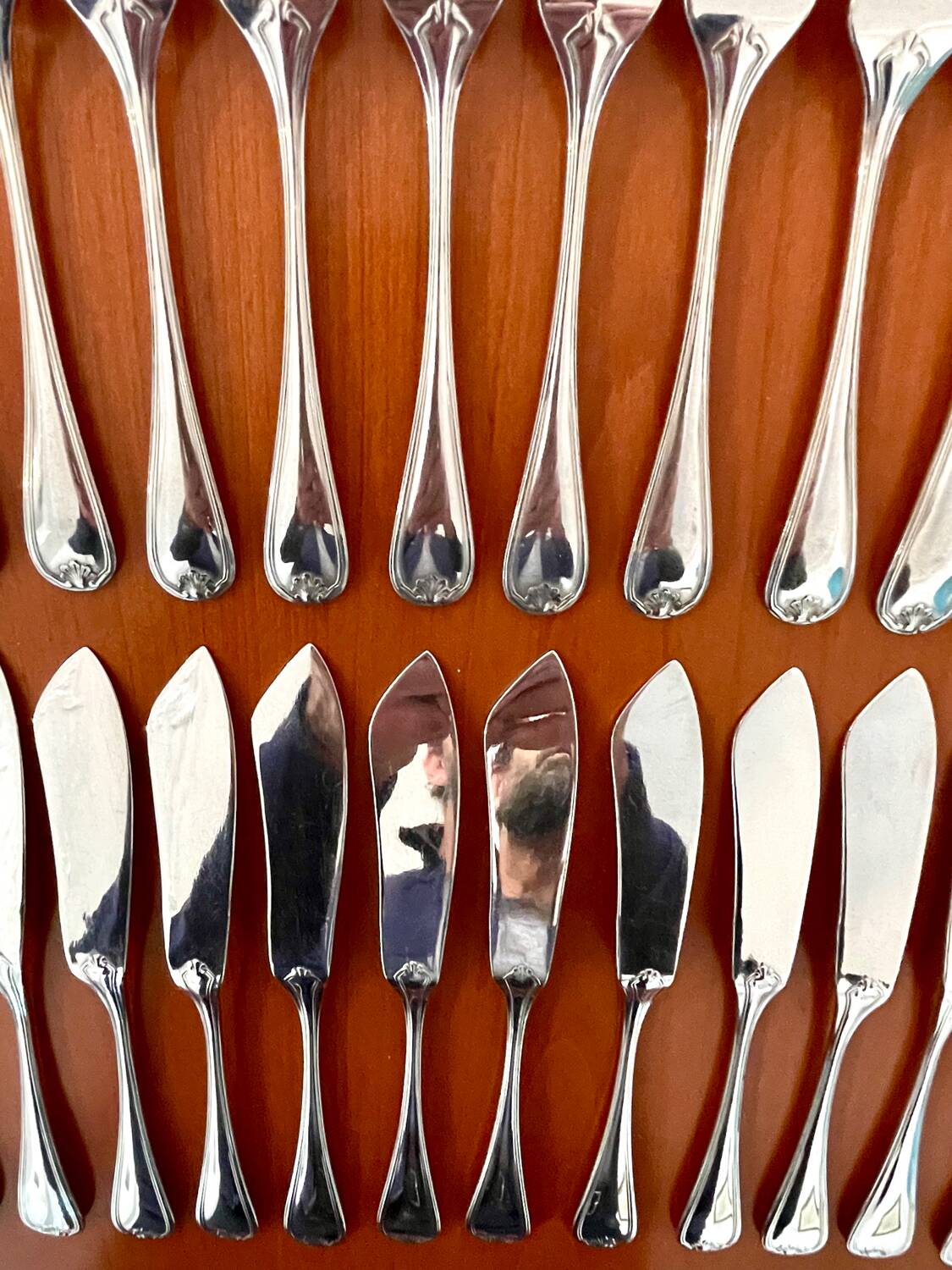 Christofle Marot Berain, 12 fish cutlery sets, shell decor