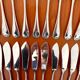 Christofle Marot Berain, 12 fish cutlery sets, shell decor