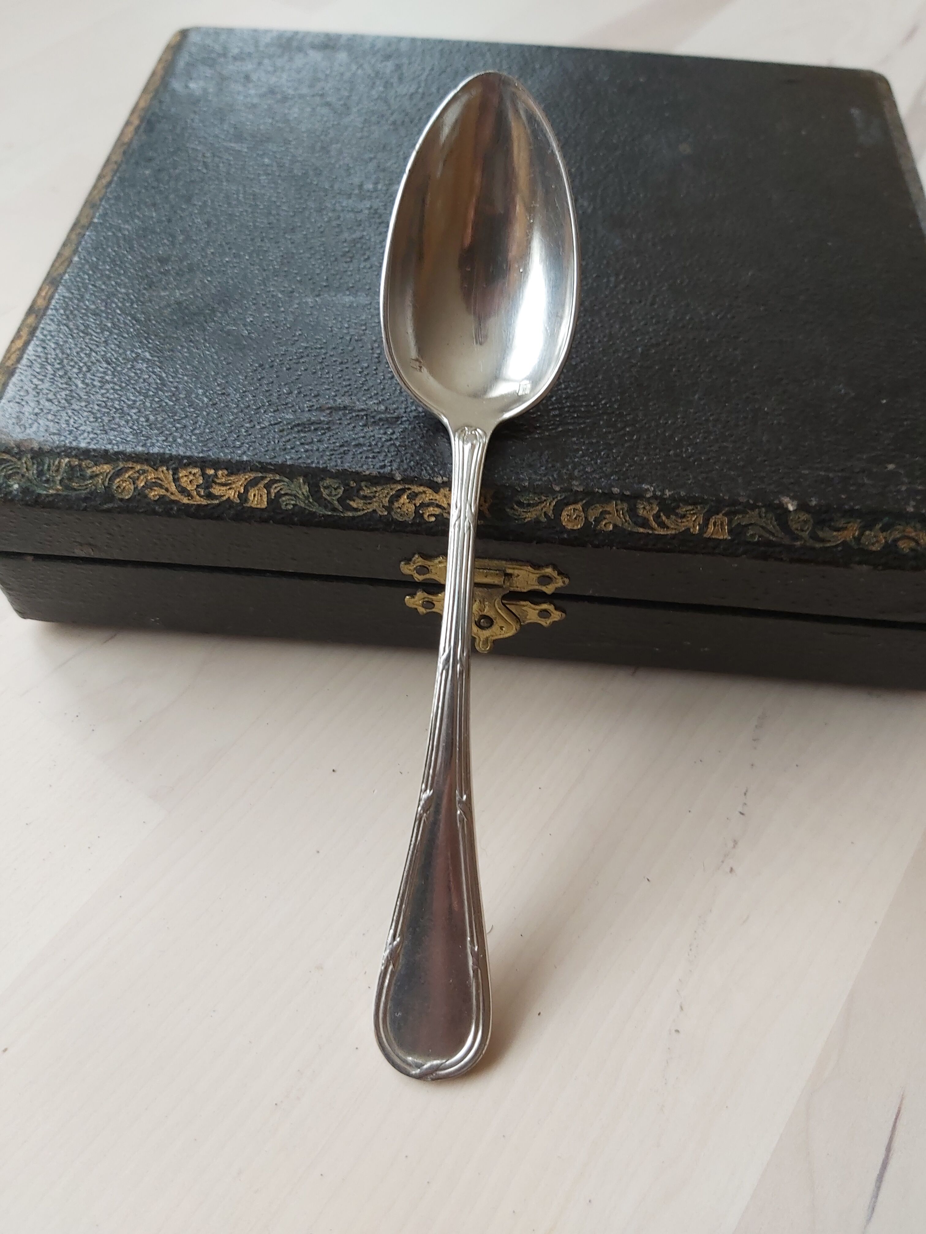 Series of 11 small silver metal spoons