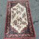 Vintage wool Persian rug with floral patterns 140x70 bedside rug.
