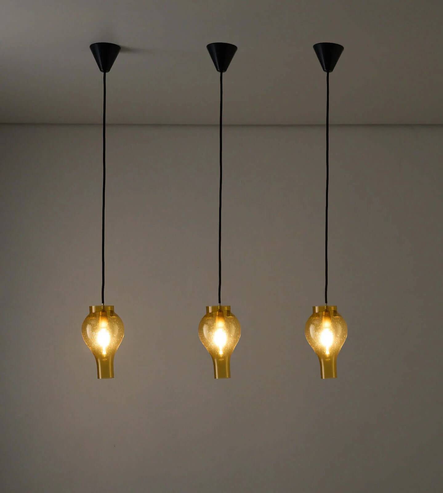 Yellow glass pendant lamp with bubbles