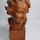 Bust of a laughing child in patinated plaster, 35 cm
