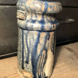 Enamelled pottery vase signed