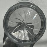 Glass ice or champagne bucket with stylized petal patterns