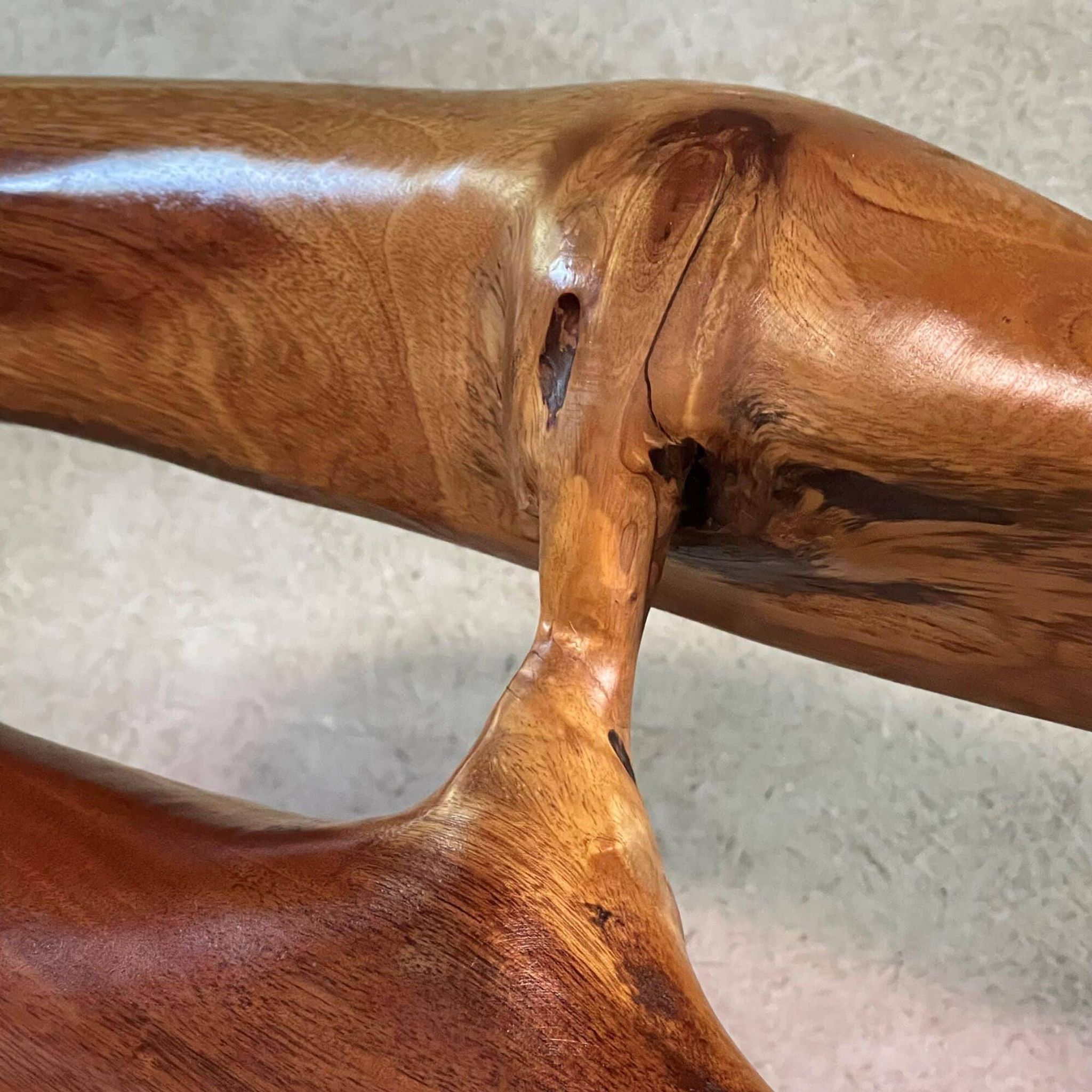 Sculptural bench in solid wood