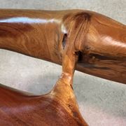 Sculptural bench in solid wood