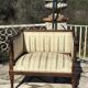 Low armchair in finely carved wood in the Louis XVI style from the 19th century