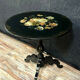 Guéridon NAPOLÉON III in blackened wood resting on a tripod foot.