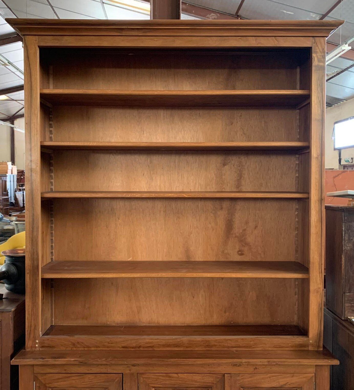 Bibus bookcase of walnut parquet with blonde patina