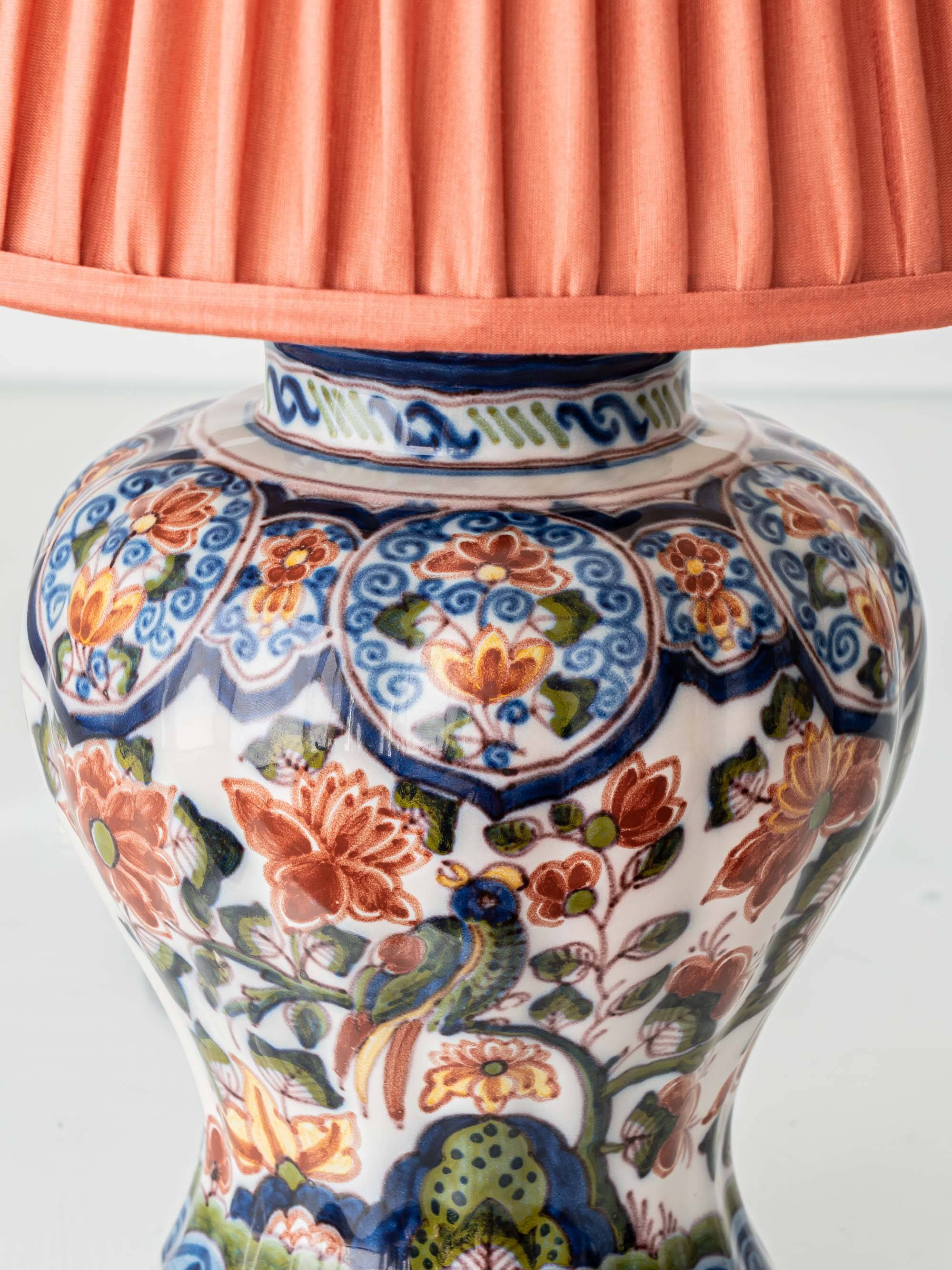 Dutch chinoiserie table lamp in polychrome Delftware, Makkum, with a new coral silk shade