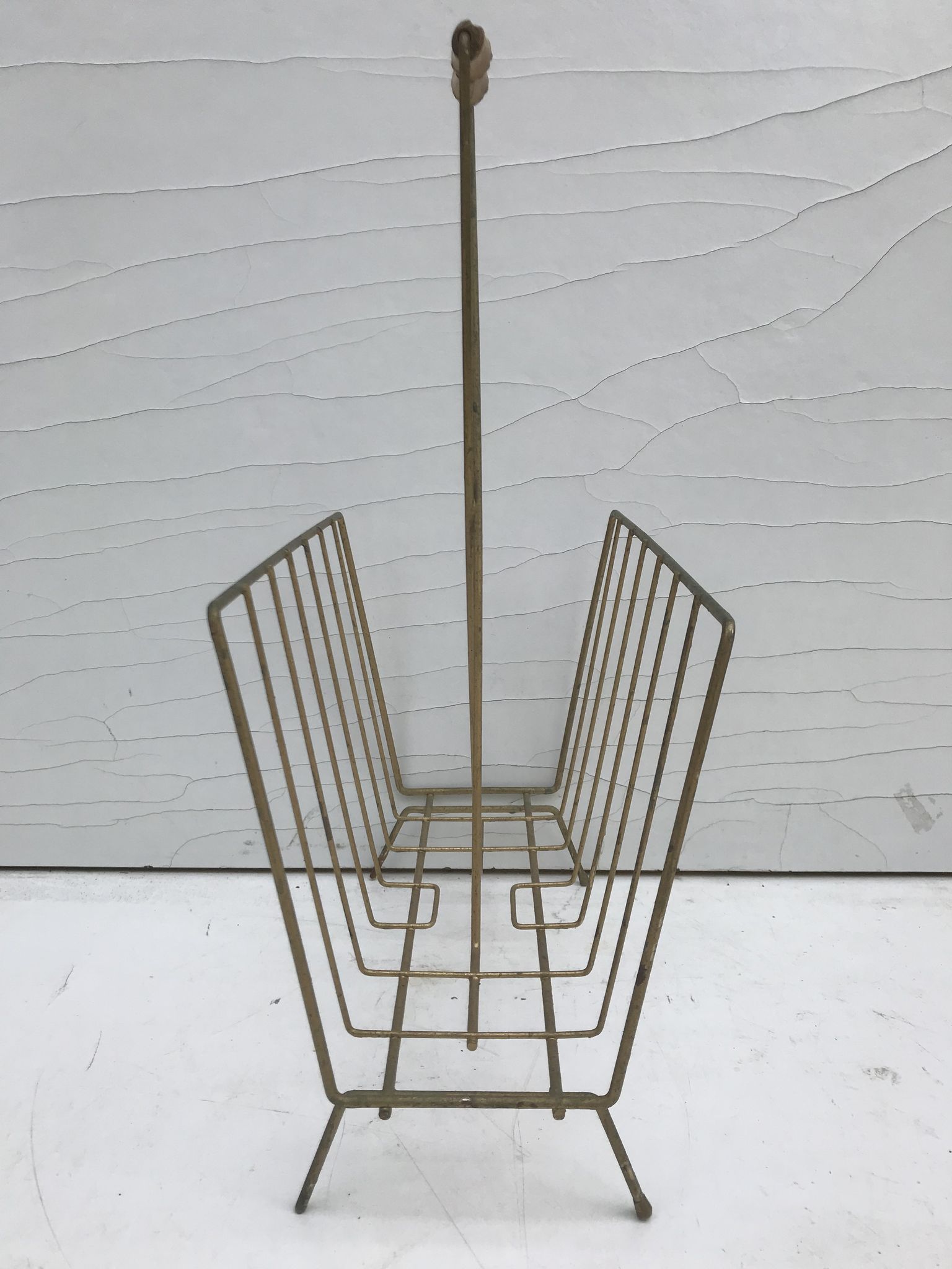 Magazine holder in golden metal and its handle is in bamboo, 1960 vintage