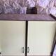 Vintage kitchen buffet in yellow and red formica - 1950
