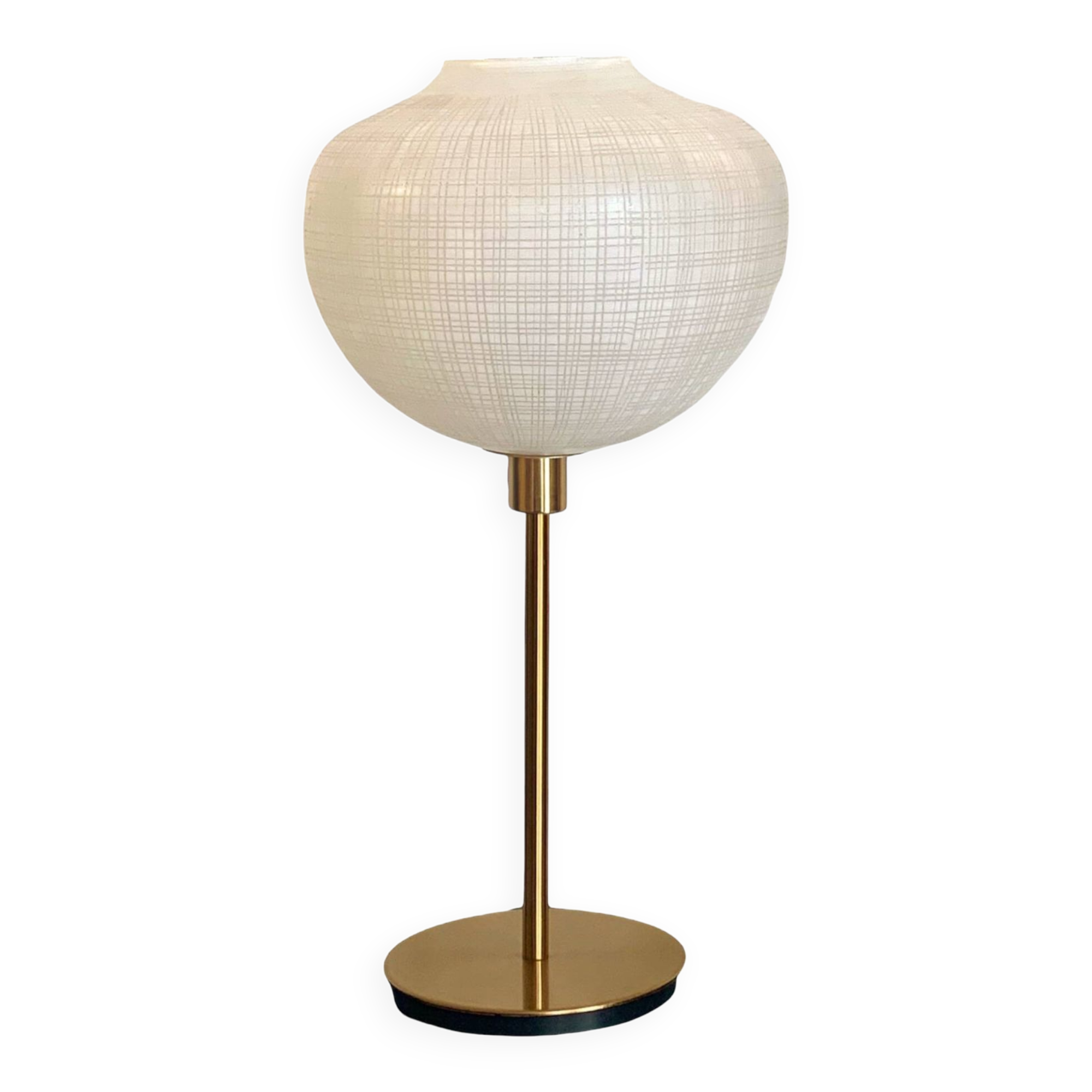Table lamp with a white striped glass globe lampshade and a gold base