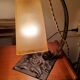 Lampe art déco des années 30 en fer forgé et tulipe en verre ambré