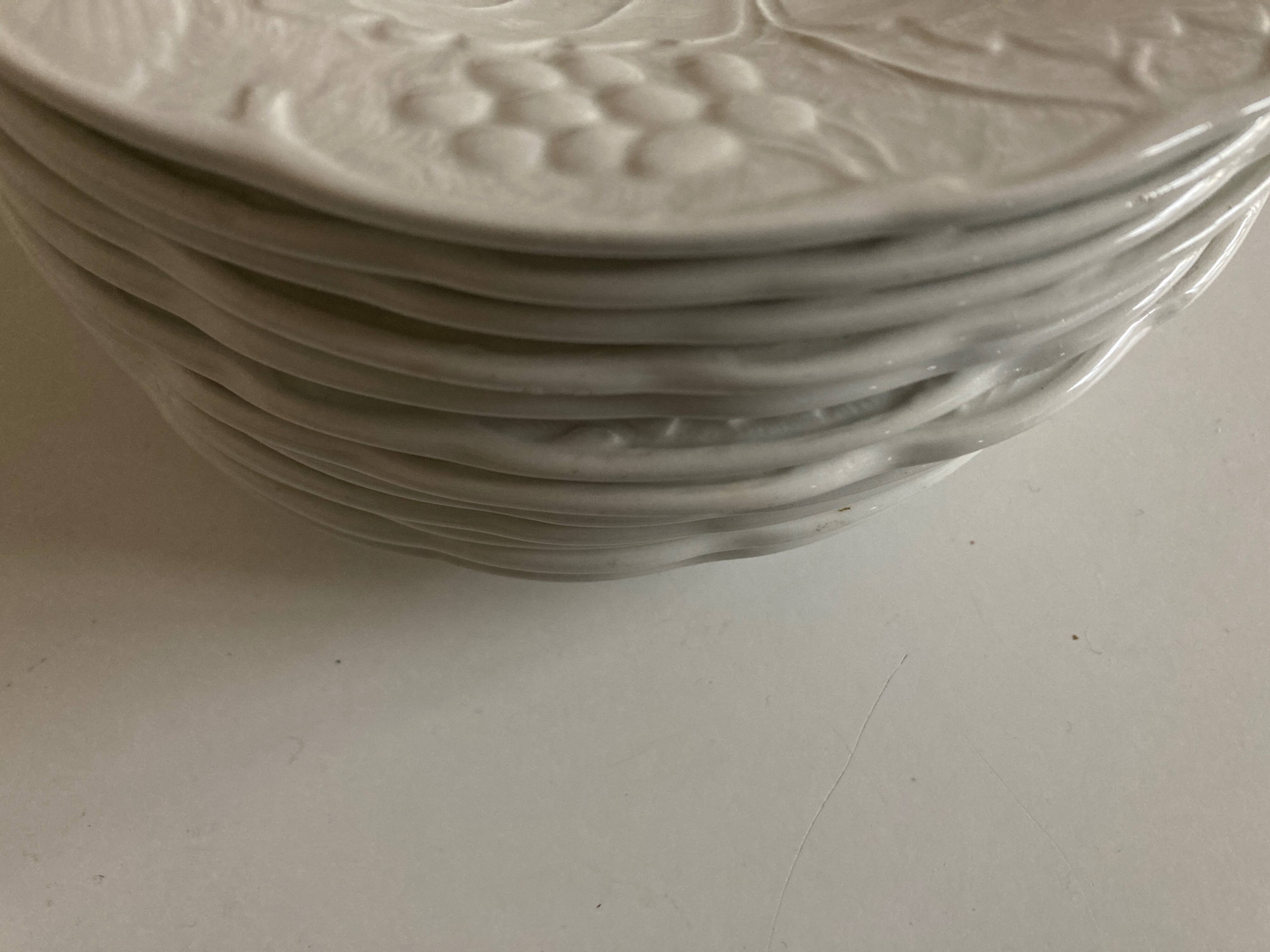 Set of 12 English earthenware plates Burleigh Davenport relief