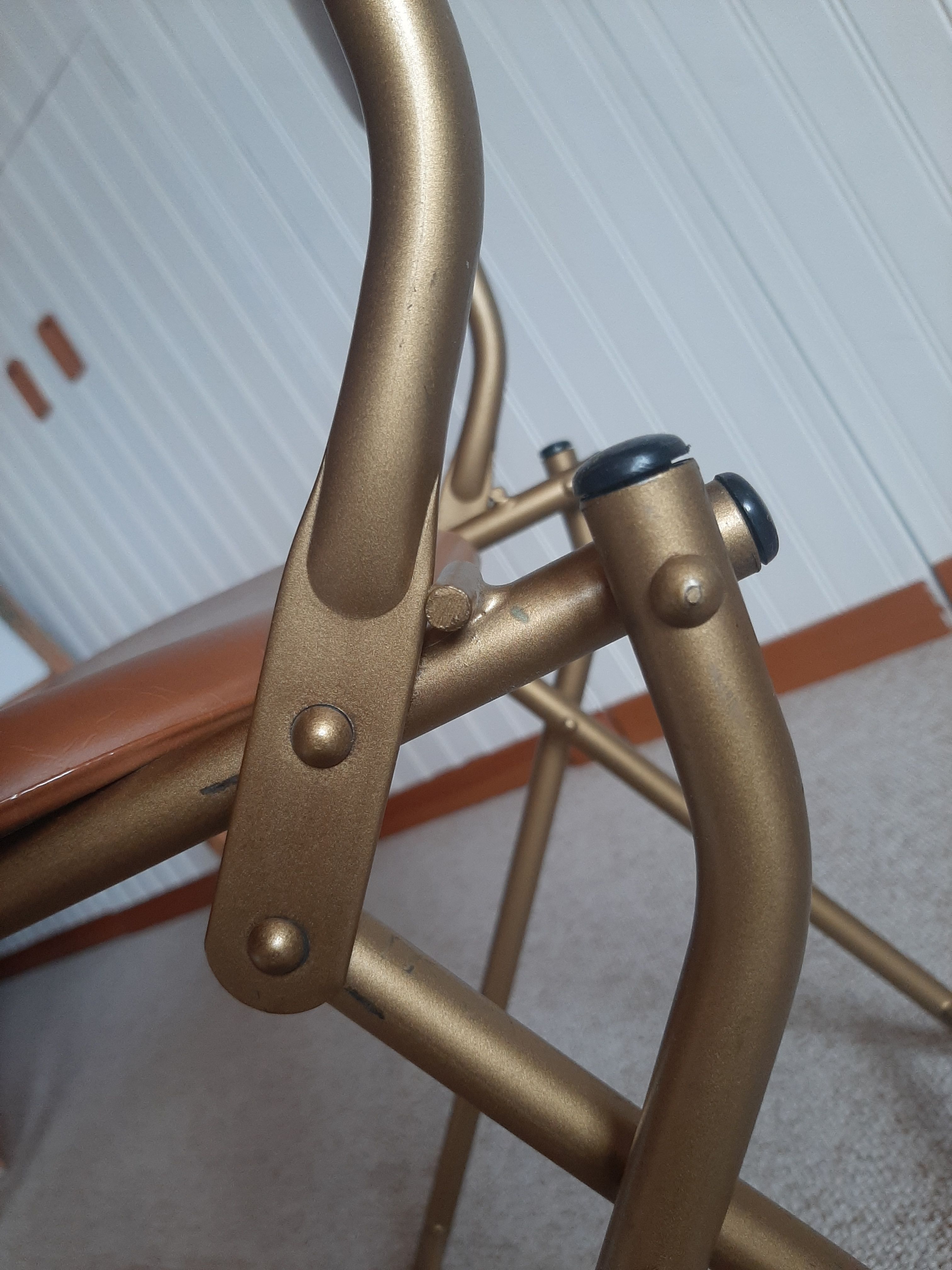 Chaise pliante structure tube et simili cuir