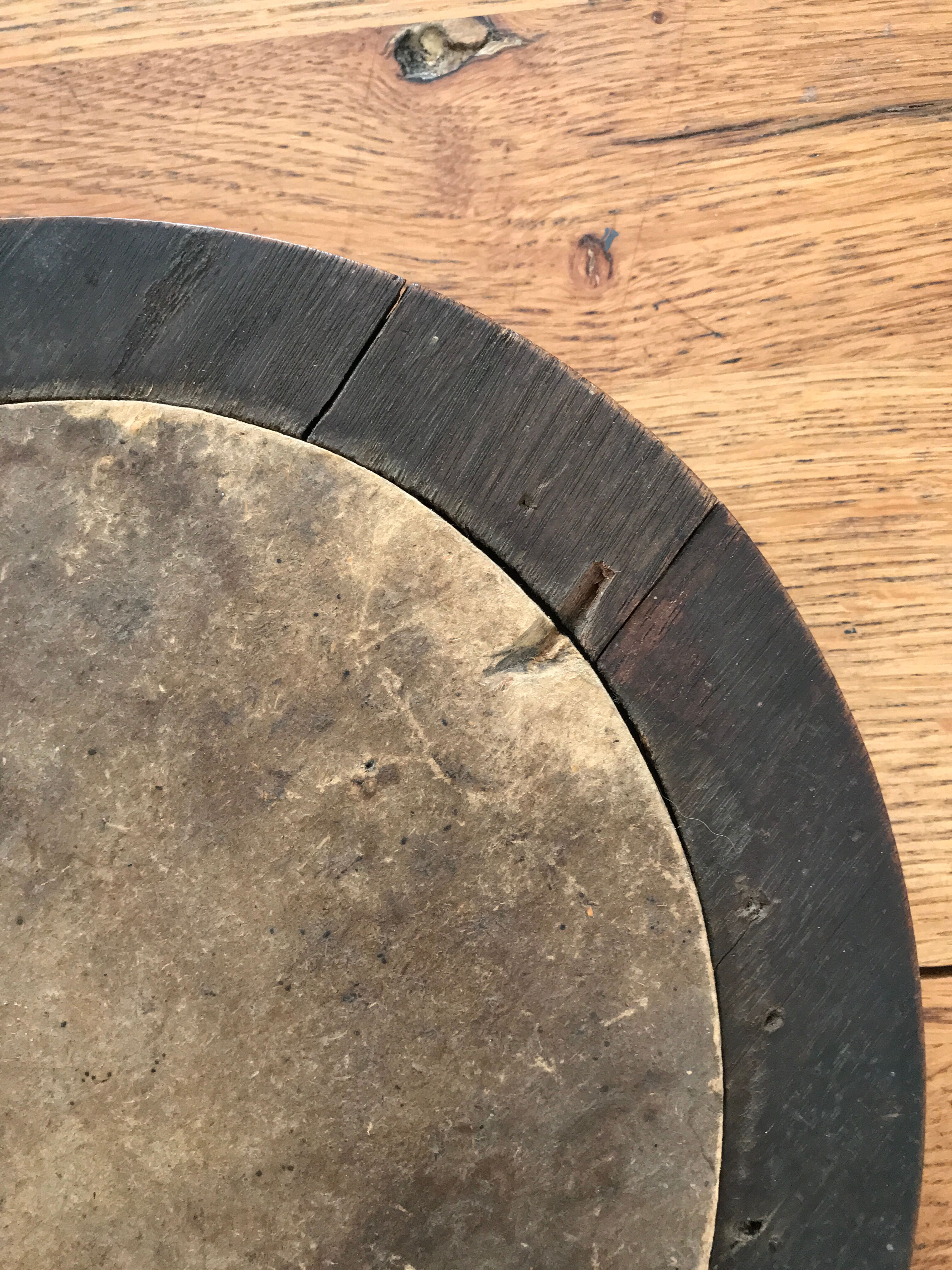 Old oval mirror with wooden frame