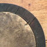Old oval mirror with wooden frame