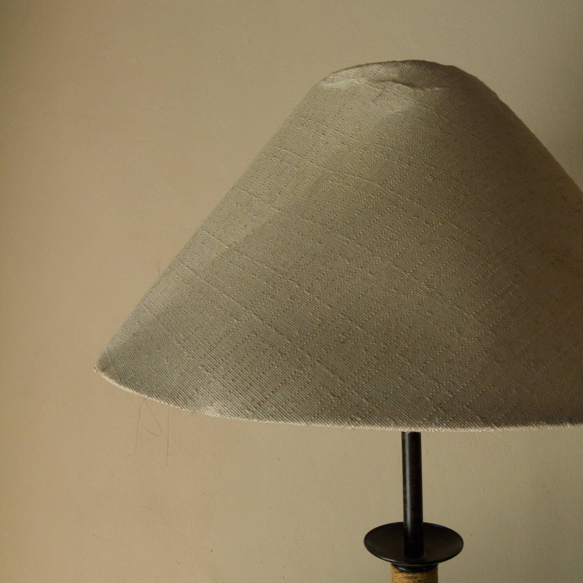 Pair of wrought iron and rope table lamps, adjustable lampshade.