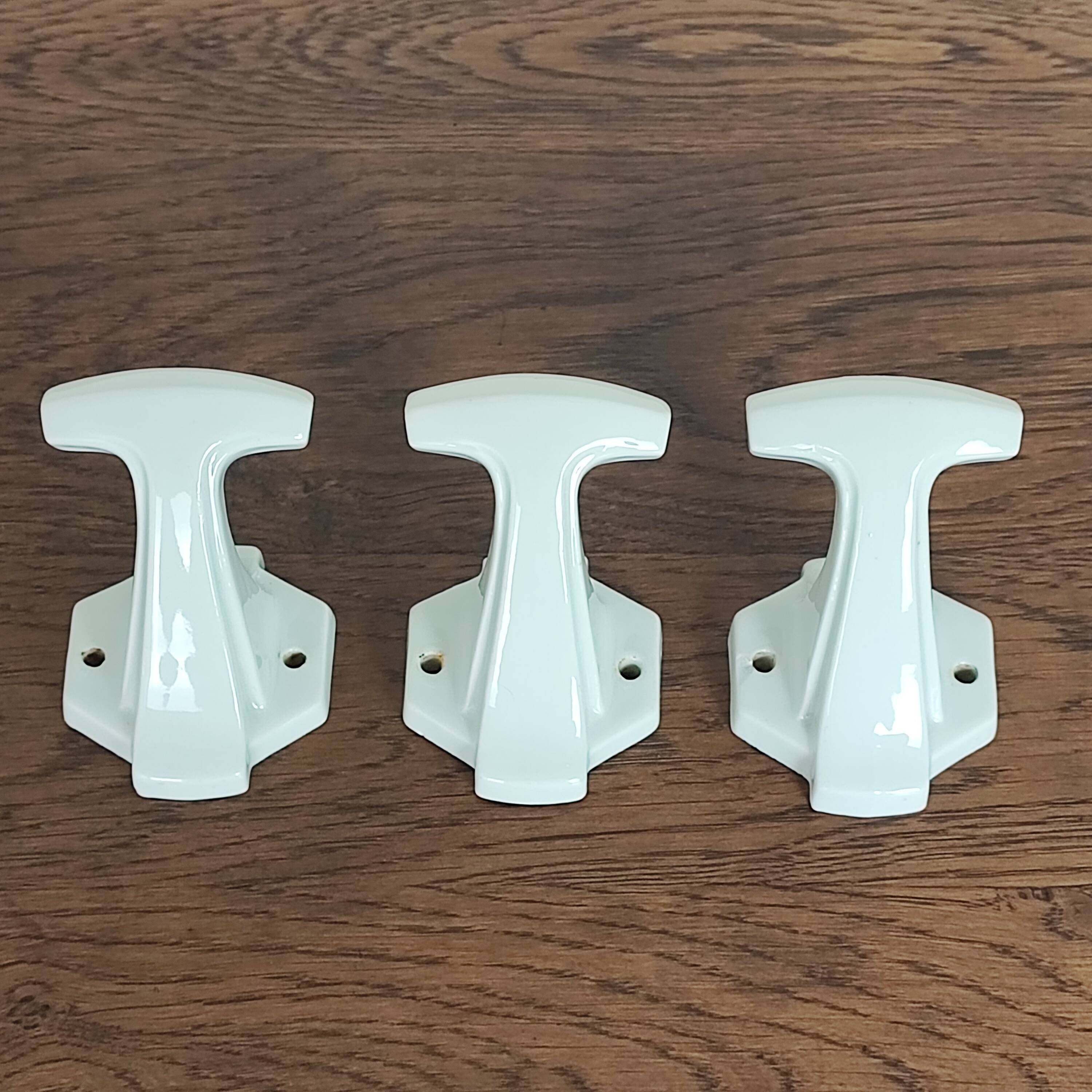3 porcelain coat hooks