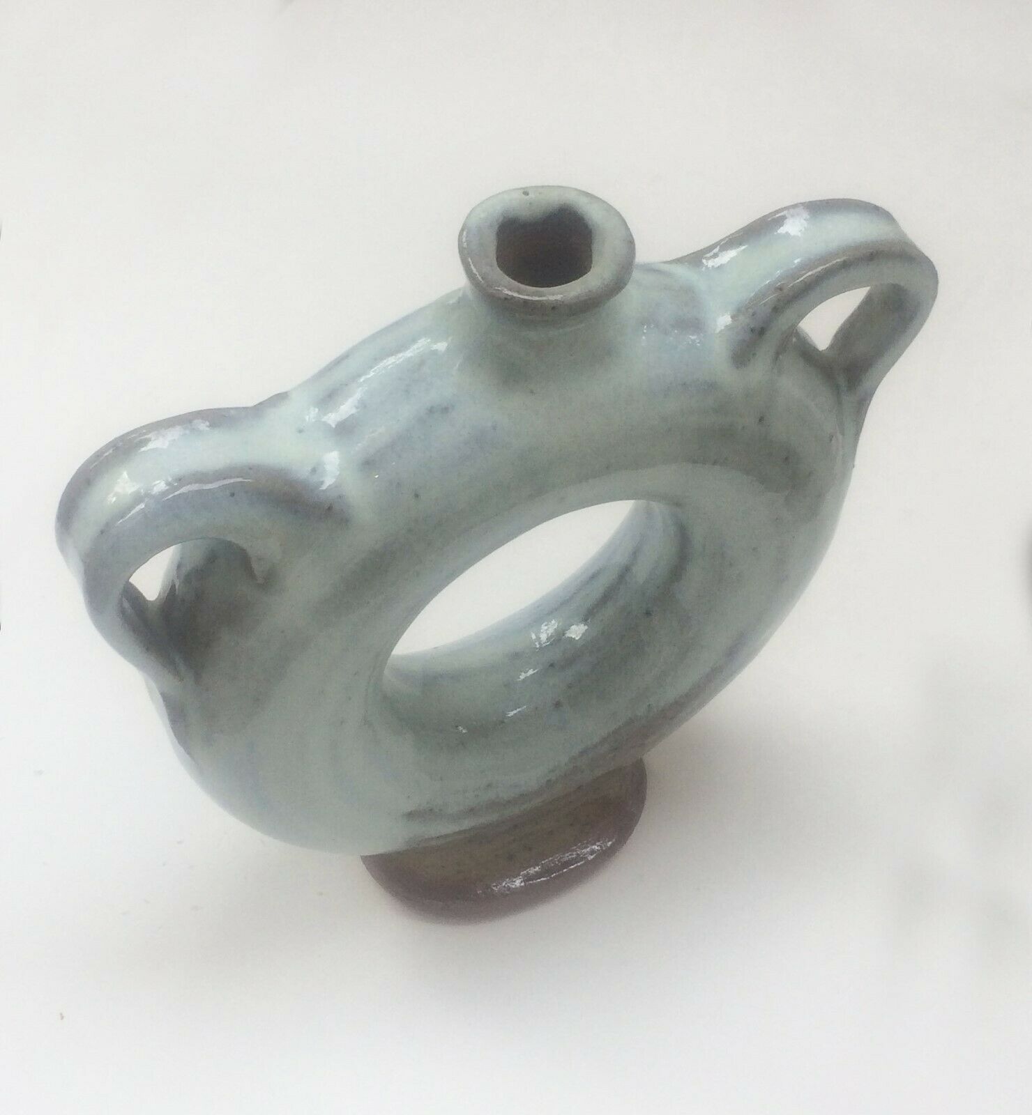 Vernified ceramic vase with handles