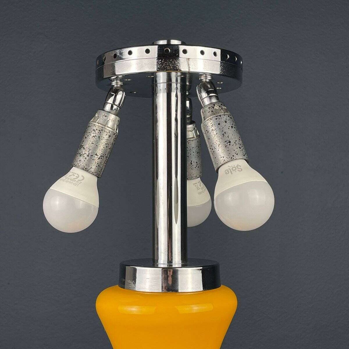 Mid-century Italian yellow table lamp from the 1970s.