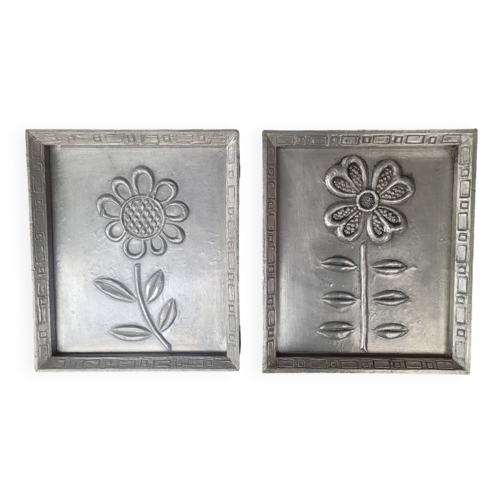 Pair of embossed flower paintings