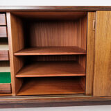 Sideboard in rosewood with sliding doors designed by Omann Junior from the 1960s.